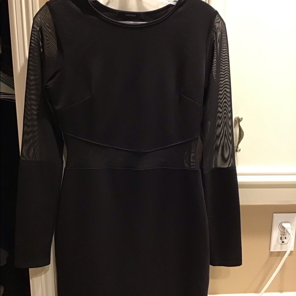 Small long sleeve short dress.